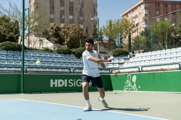 tennis hard court action